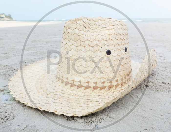 Wooden Weaved Hat in a beach