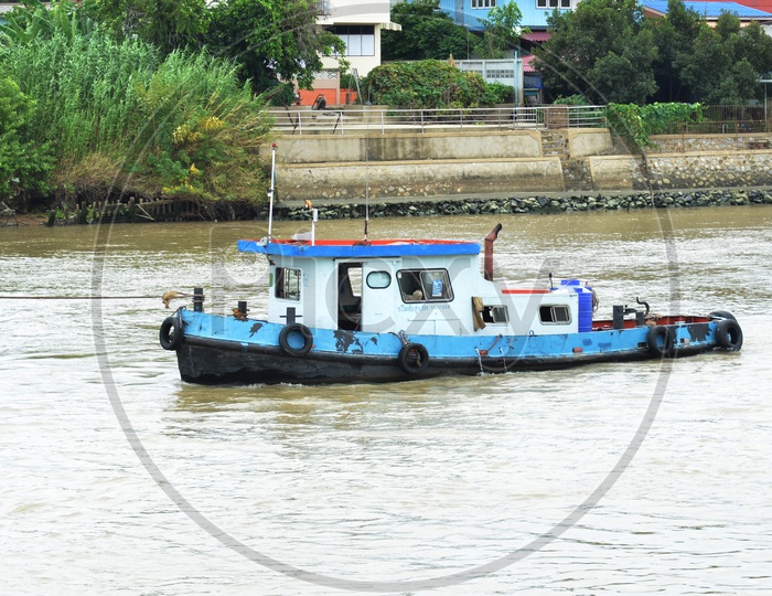 A Cargo ship on the Thailand River