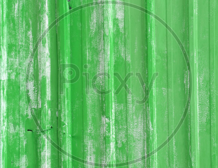 Rusty corrugated iron metal fence Zinc wall texture background of  Green color