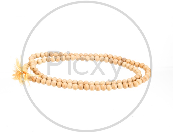 Chanting Mala or Japa Mala With Wooden Beads On an isolated White Background