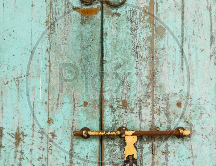 an old wood door with lock