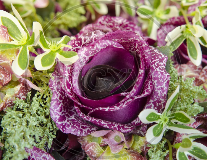 A Thai wedding bouquet with purple rose bush
