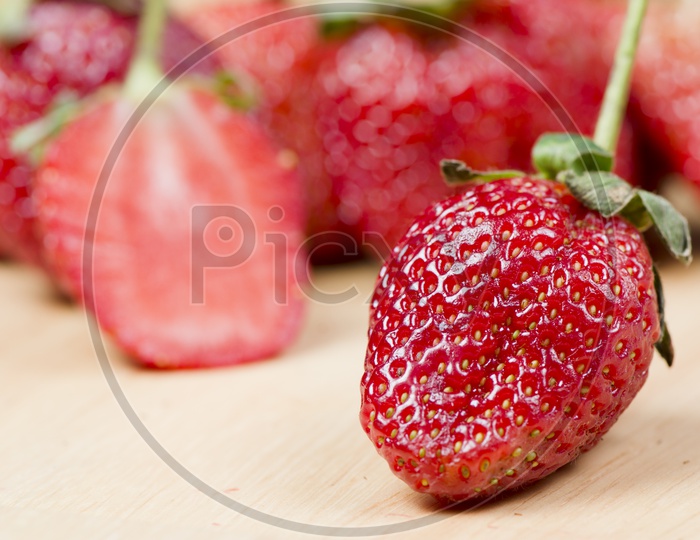 Fresh Strawberry on Wooden Background