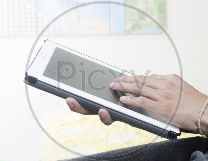 Young Business man Hands working On  digital tablet Gadget