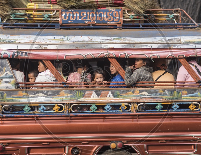 Local People traveling in a van at  Luang Prabang Morning Market in Laos.
