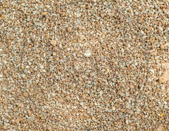 Texture Of Sea Stones In a Shore Closeup Forming a Background