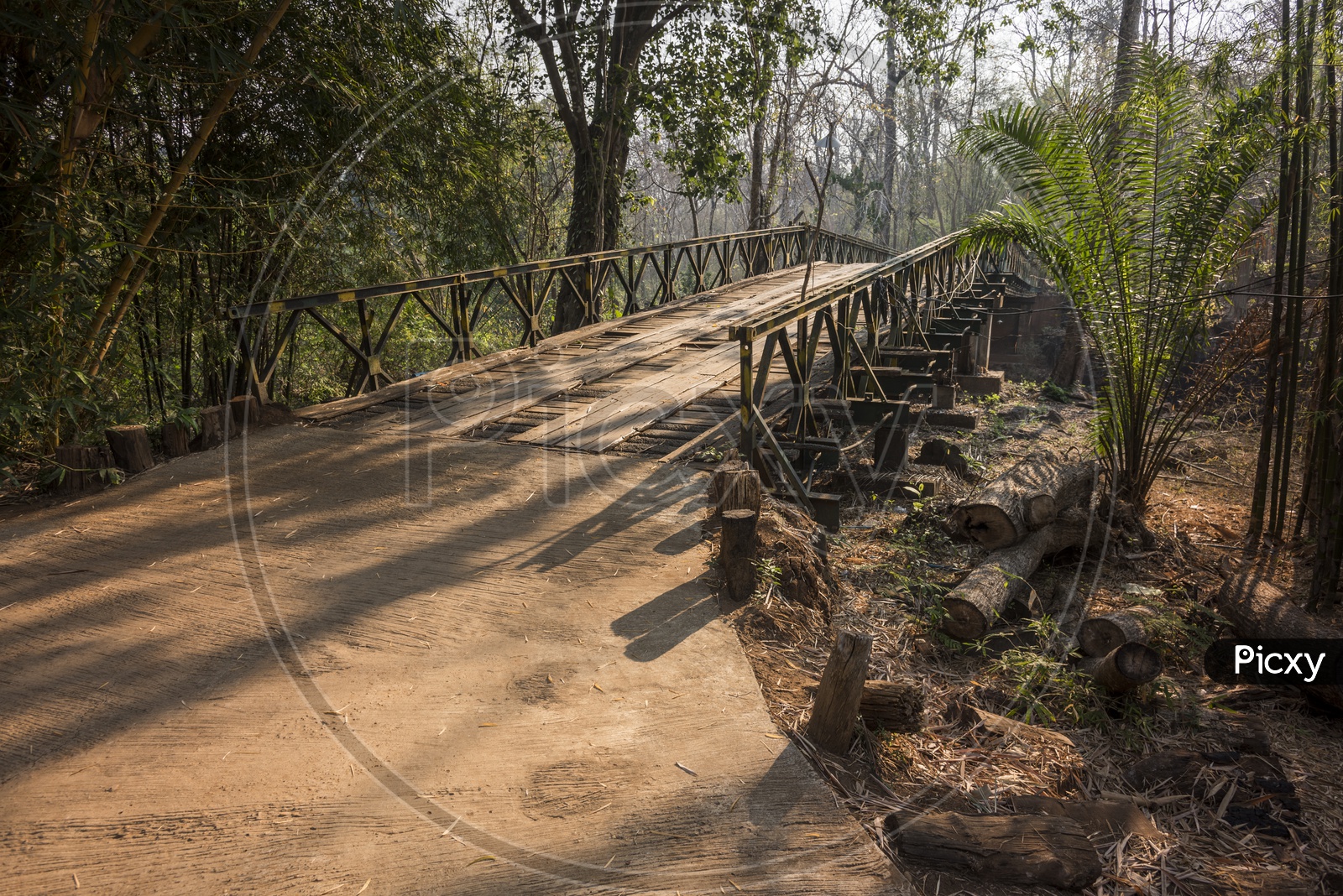 A Wooden bridge in Laos during sunrise