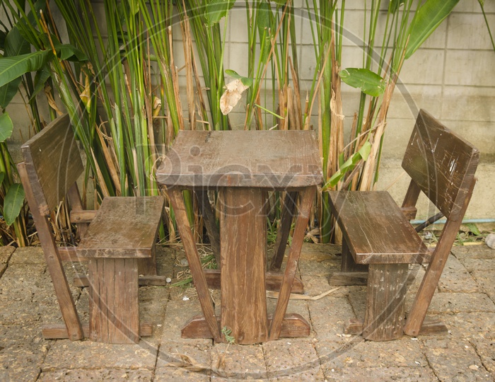 Ancient wooden table in the Thai garden