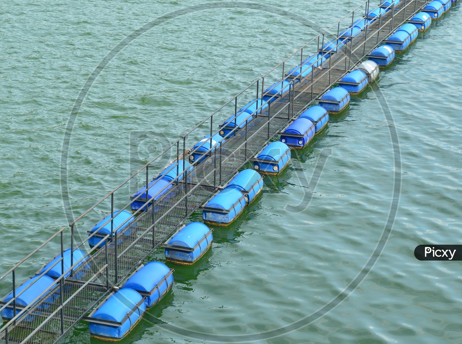 Image of Buoy floating on water in Hydroelectric Power plant of