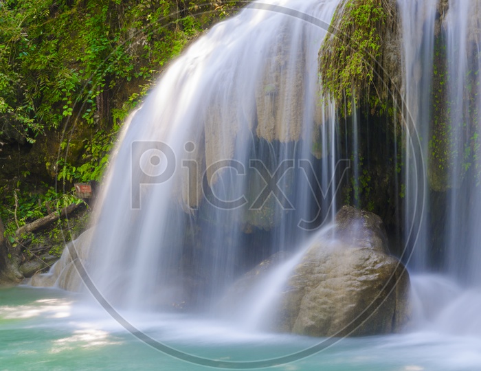 Long Exposure Of Erawan Waterfalls With Smooth Water Flowing Texture