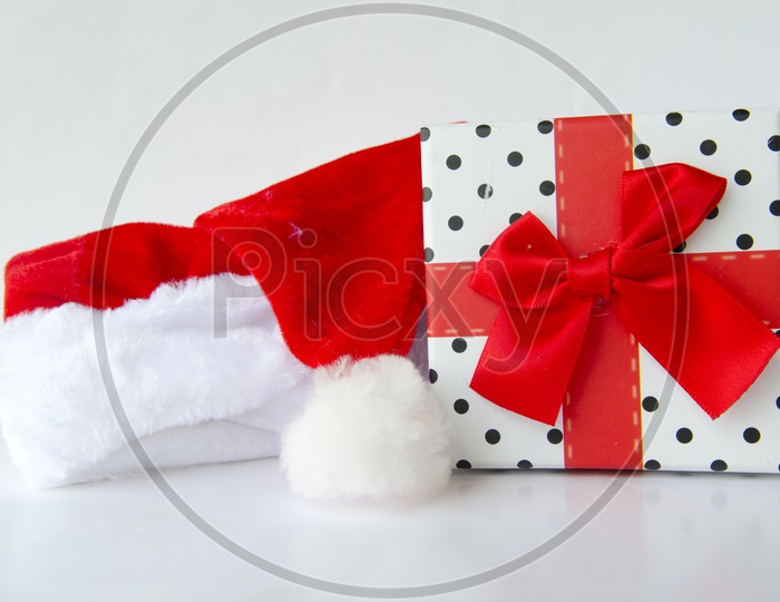 Santa Claus hat and Gift Box for Christmas Festival