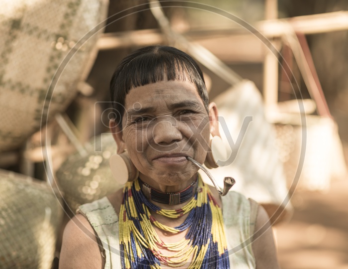 Portrait of  Alak tribe woman in village near plateau Bolaven, Laos