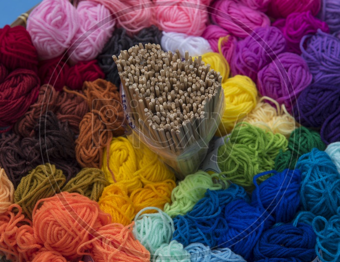 Colorful yarn with knitting sticks