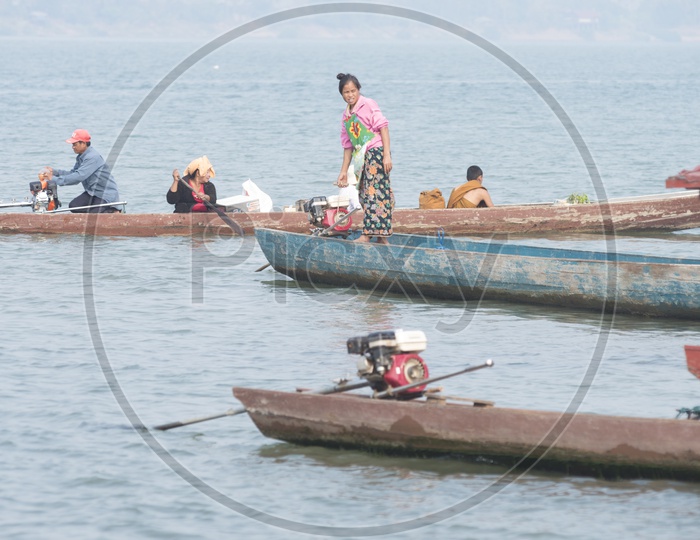 Fishermen along the banks of the Mekong river, Laos.