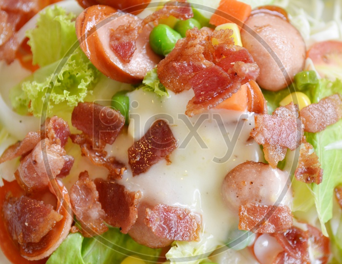 Fresh Salad With Beef Pieces Served in a Plate  Closeup