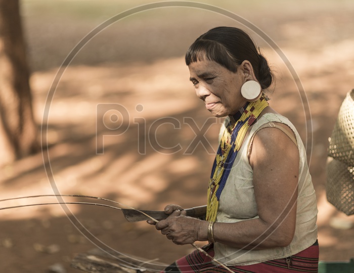 Unidentified Alak tribe woman in village near plateau Bolaven, Laos