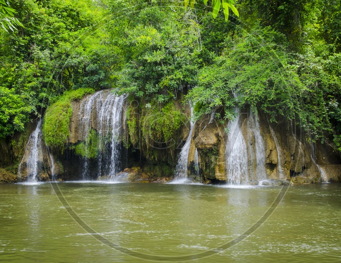 A Low Waterfalls  in the tropical forest of Thailand