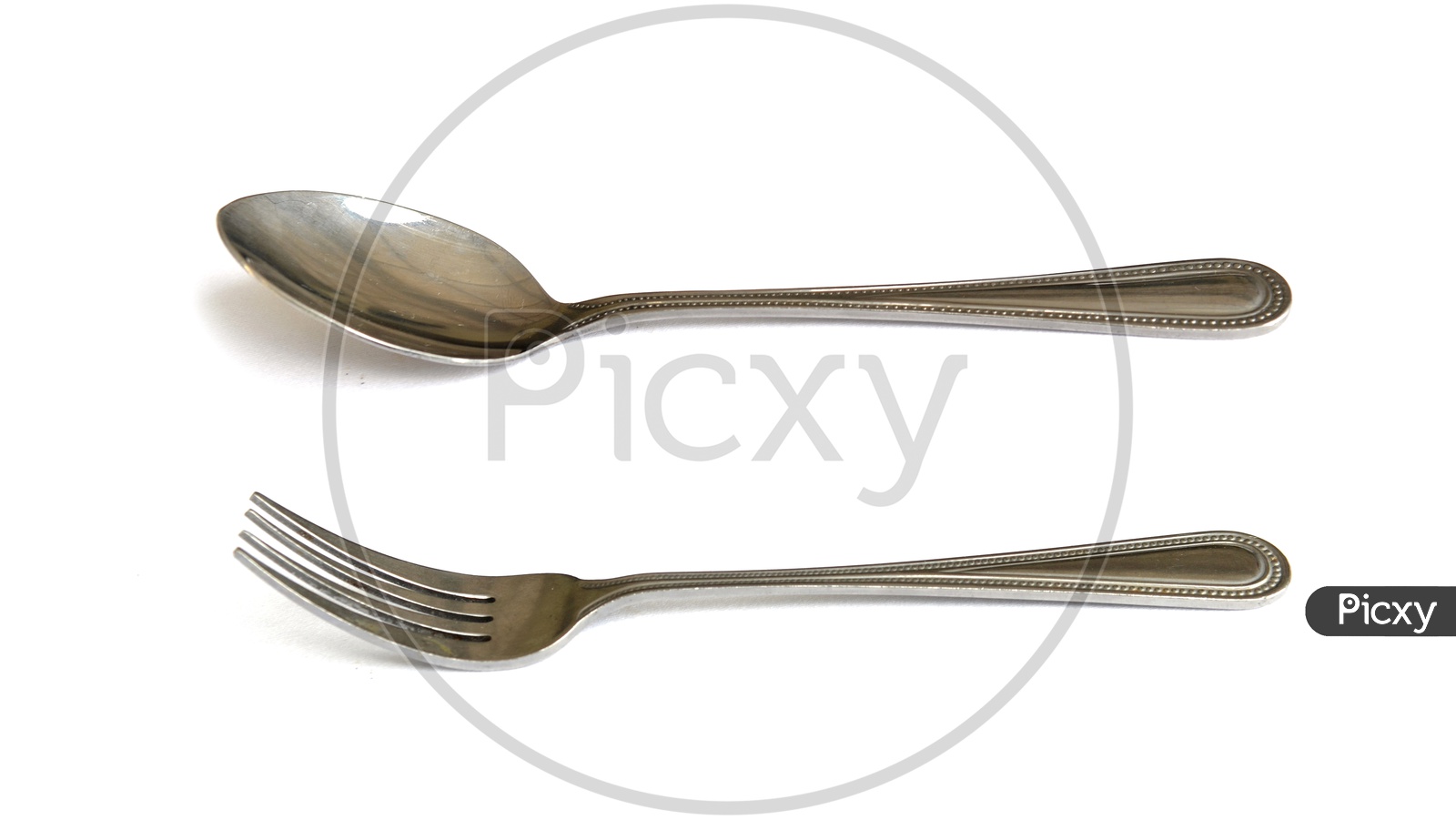 Cutlery: spoon, fork. Isolated on white background