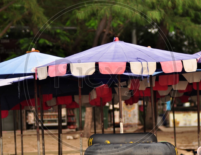 Beach Umbrella sets along the shore in Thailand