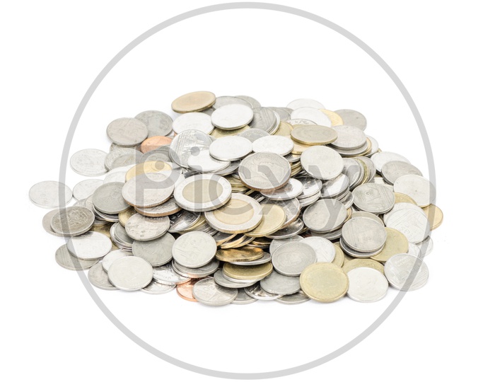 Currency Coins Pile Over an isolated White Background