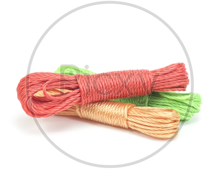 bundle of colorful nylon ropes on white background