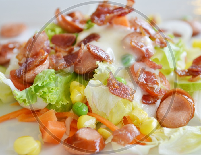 Fresh Salad With Beef Pieces Served in a Plate  Closeup