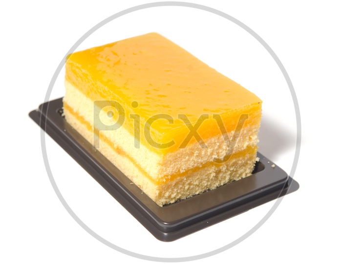 A Pastry orange cake served in a plate
