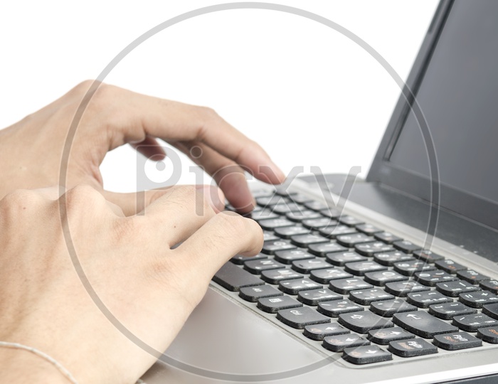 Young Woman  Hands Working On Laptop Over an isolated white Background