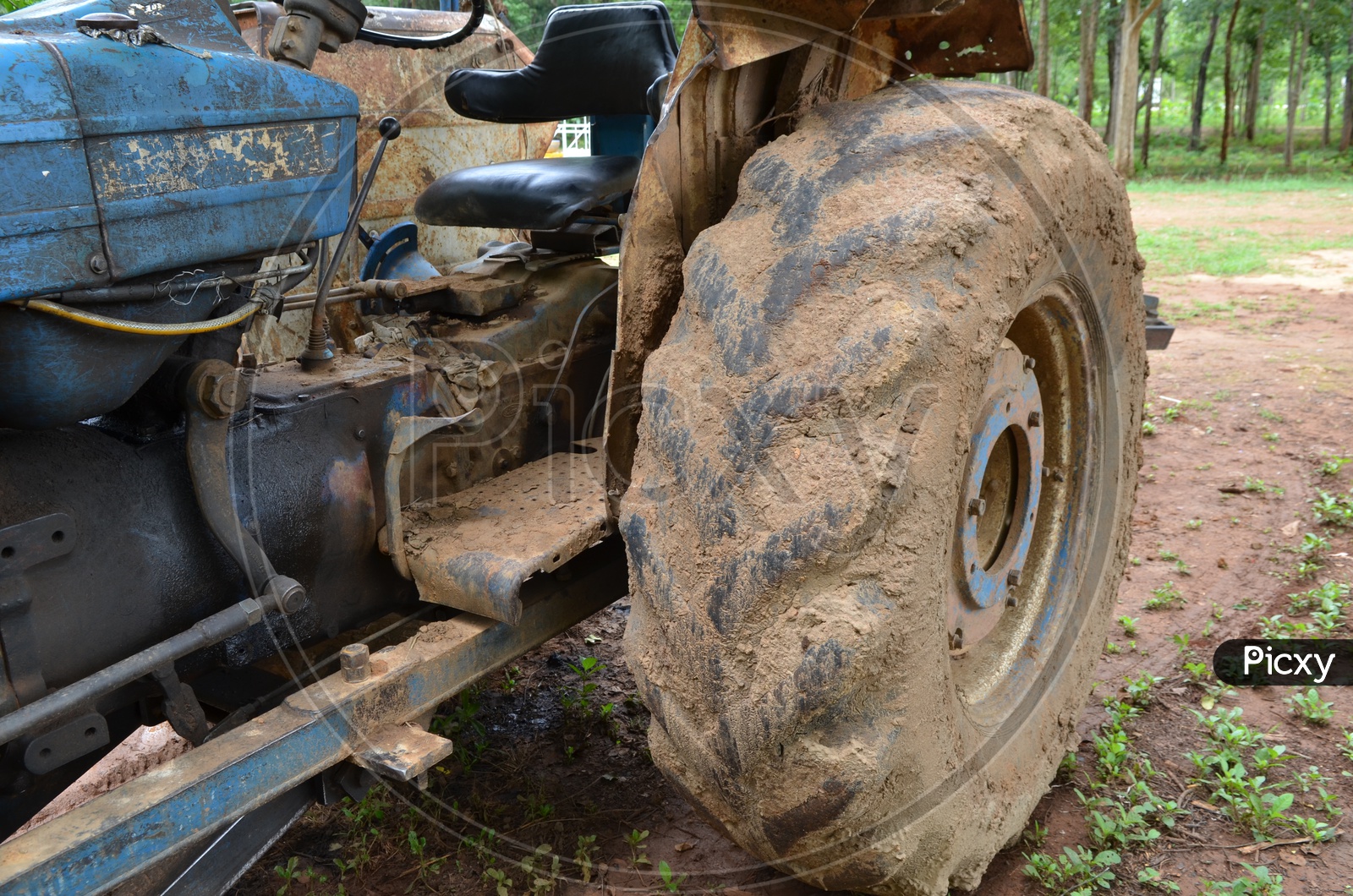 Mud On Tyre of Tractor In agricultural Fields
