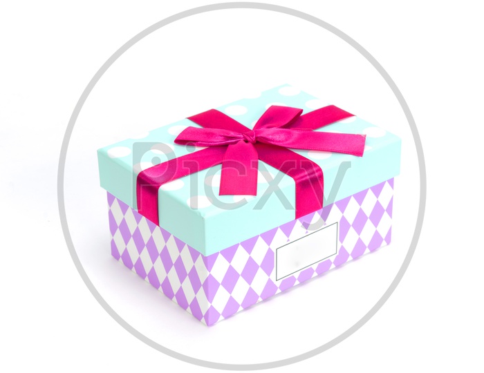 A Polka dotted gift box with wrapper