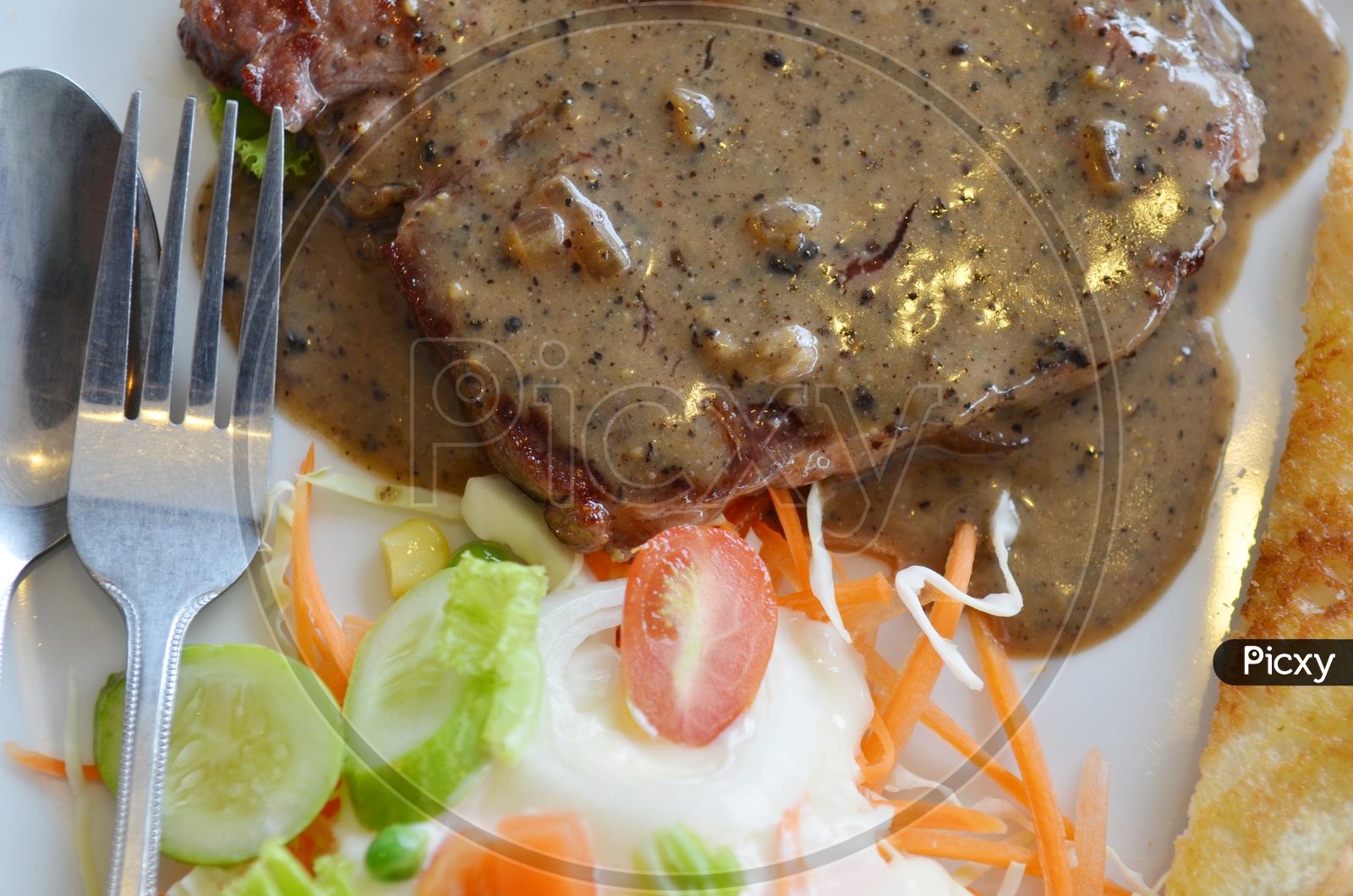 Grilled beef steak Served with Fresh Salad