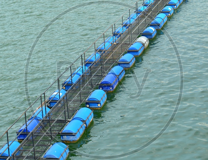 Buoy floating on water in Hydroelectric Power plant of dam
