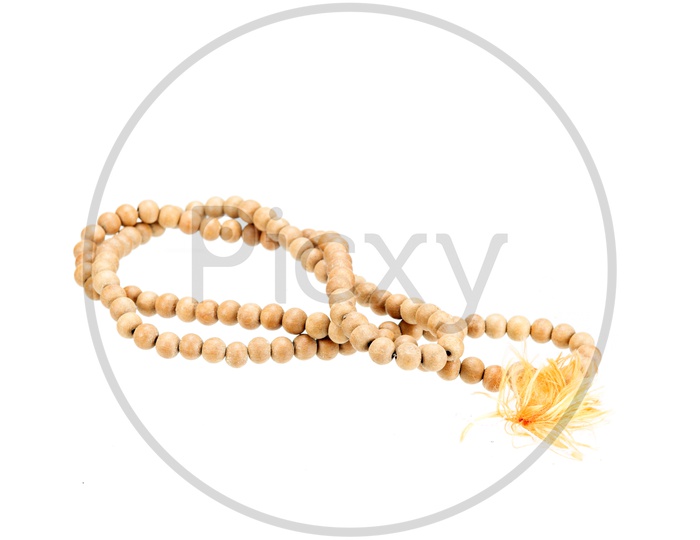 Chanting Mala or Japa Mala With Wooden Beads On an isolated White Background