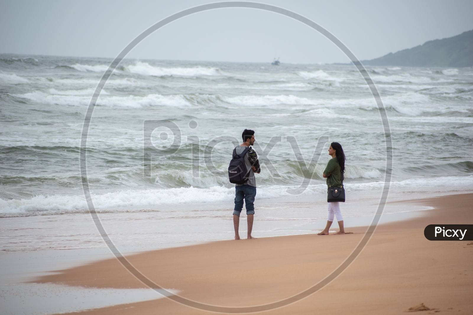 Couple at Candolim beach, Goa