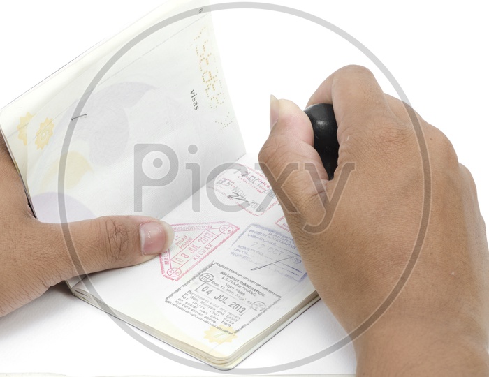 passport pages and immigration stamp , Travel Concept