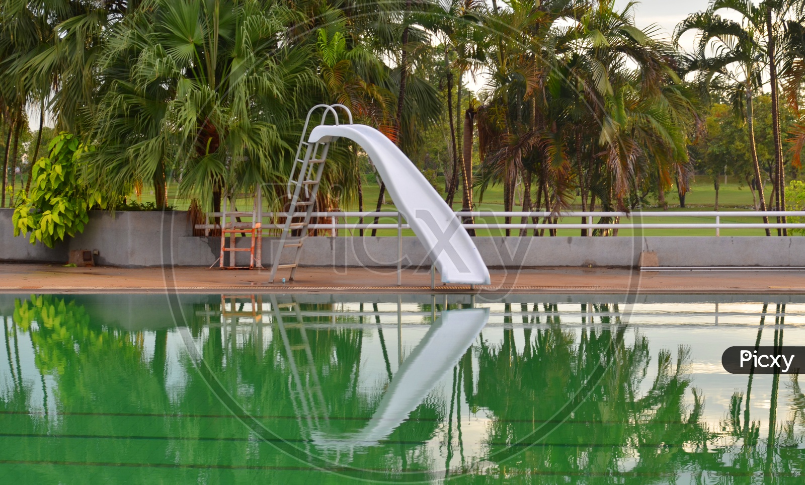 A Water Slide by the swimming pool