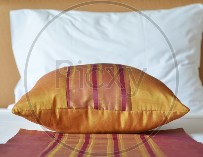Pillows And Bed in a Comfortable Deluxe Bedroom of a Hotel Or Resort