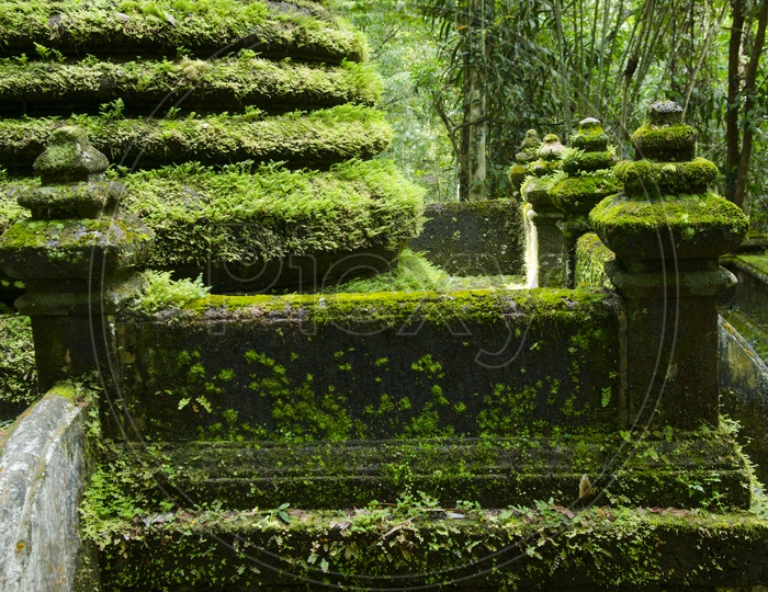 Old pagoda with moss at Phlio waterfall national park in Chanthaburi Province Thailand