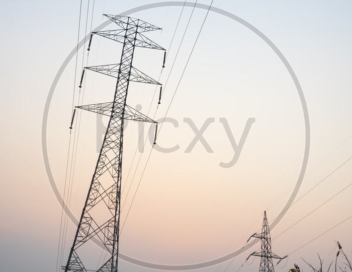 Hi Tension Transmission towers during sunset in Thailand