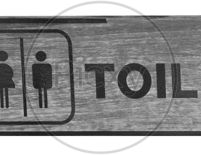 A Toilet signage on the wall