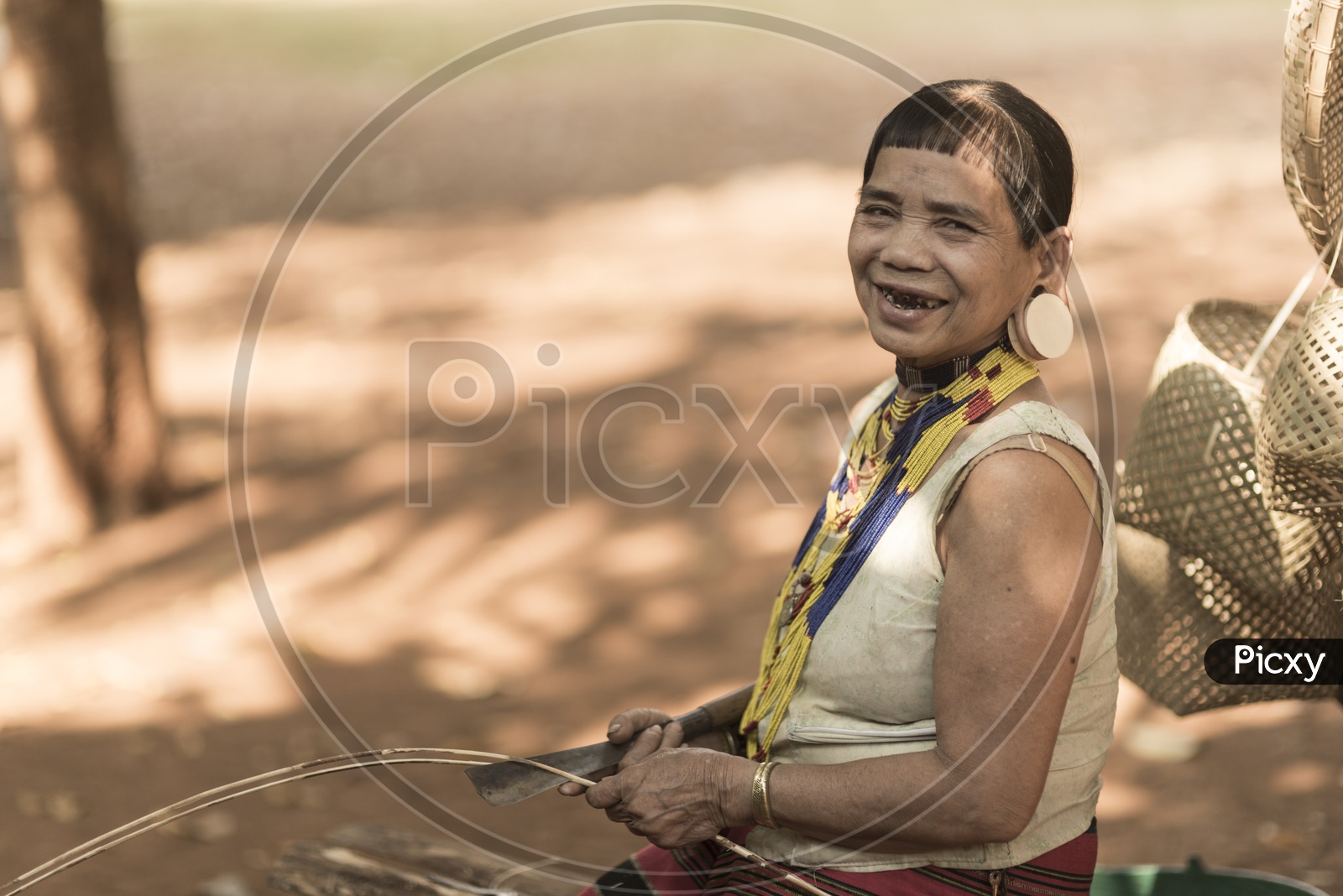 An Alak tribe woman in village near plateau Bolaven, Laos on june 12, 2015