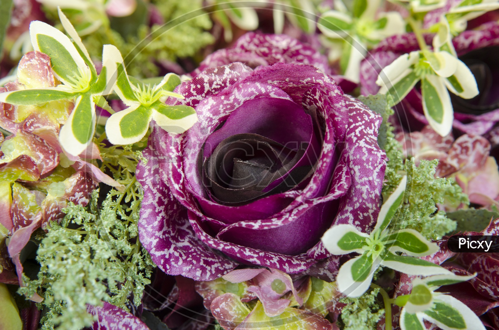 A Thai wedding bouquet with purple rose bush