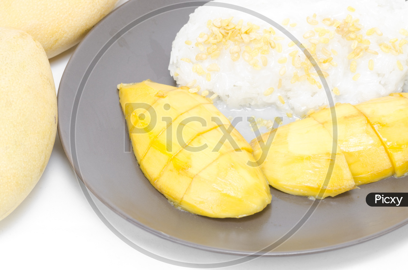 Thai dessert, Sweet mango with sticky rice mix with coconut milk Isolated on White Background