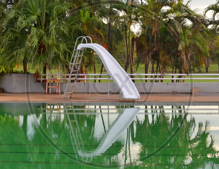 A Water Slide by the swimming pool