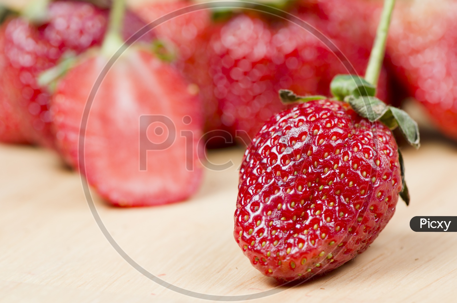 Fresh Strawberry on Wooden Background