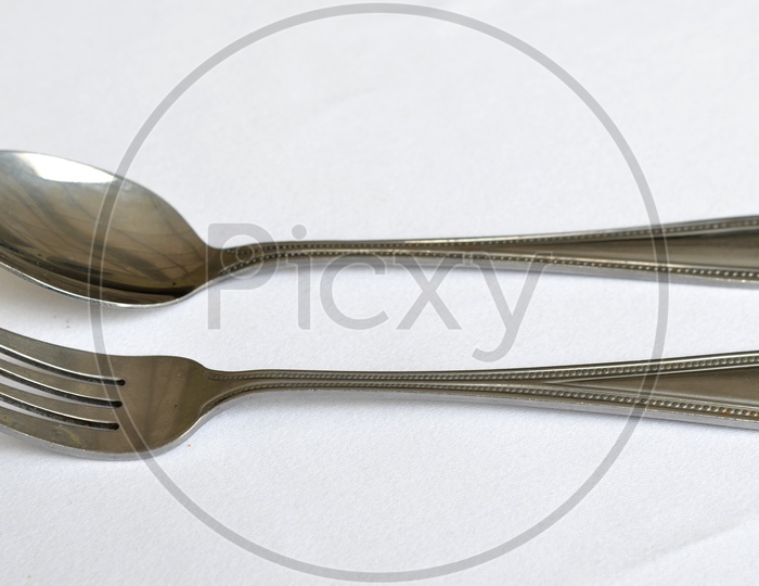 Fork And Spoon On an Restaurant Dining Table