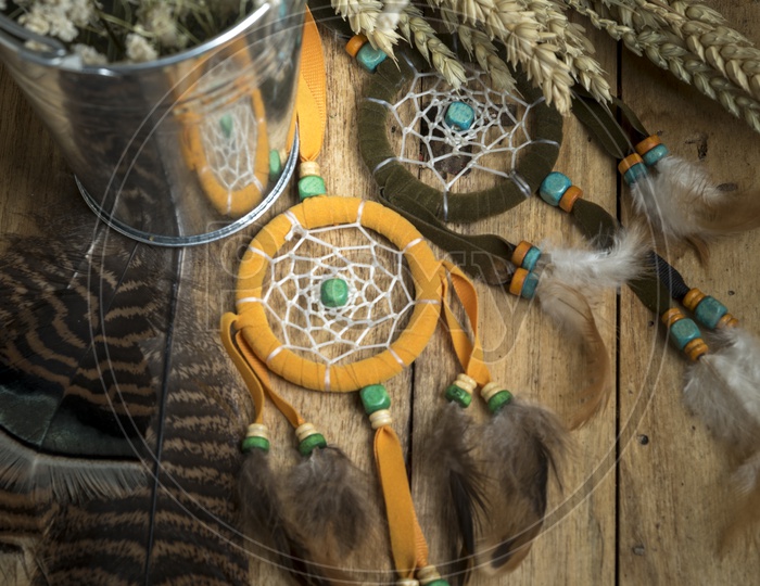 handmade dreamcatcher with bright feathers
