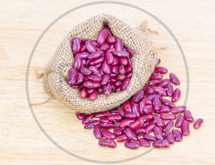 Purple colored beans in sack