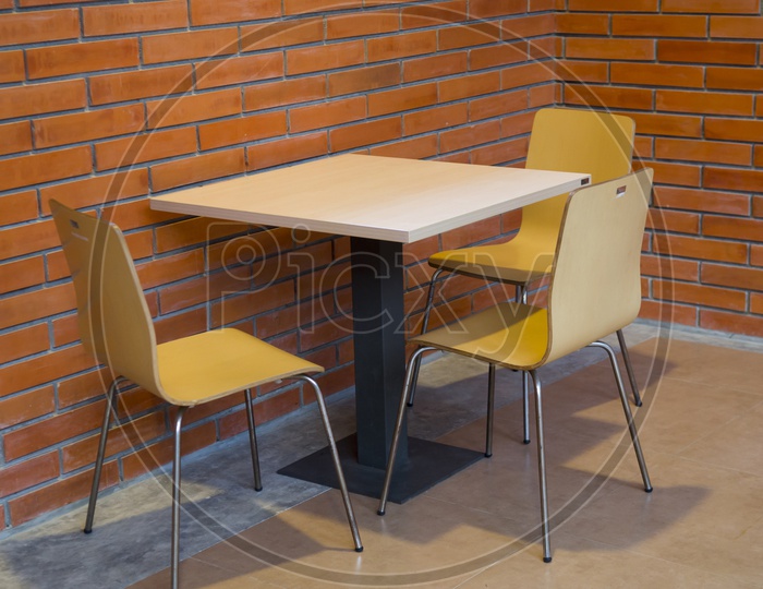 modern interior table and chairs in Thai cafe