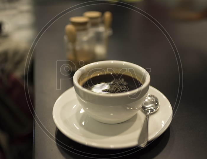 Cup of Black Coffee on Table